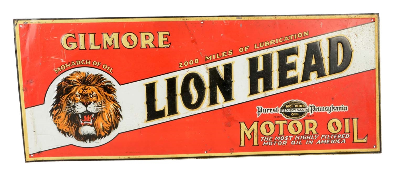 GILMORE LION HEAD EMBOSSED TIN TACKER SIGN. 
