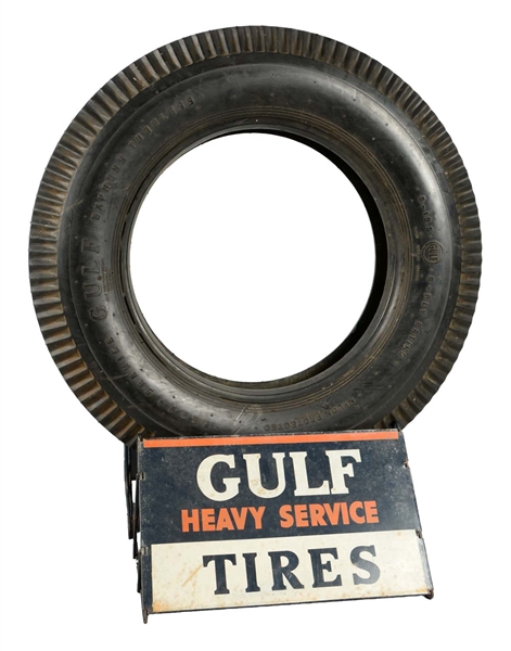 GULF HEAVY SERVICE TIRES STAND AND TIRE.