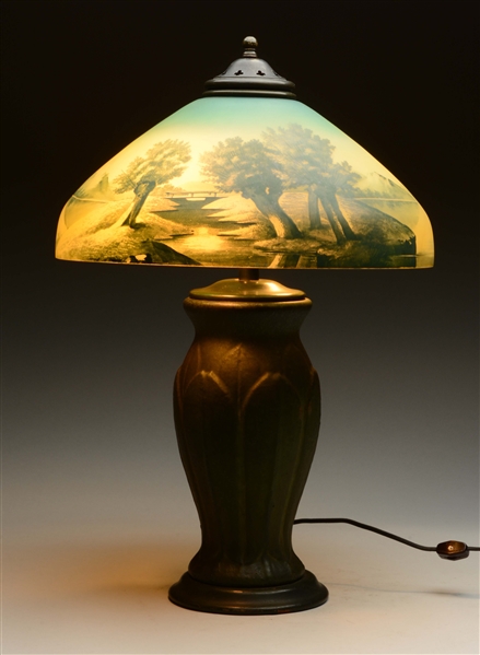 POTTERY BASED LAMP WITH REVERSE ON GLASS SHADE. 