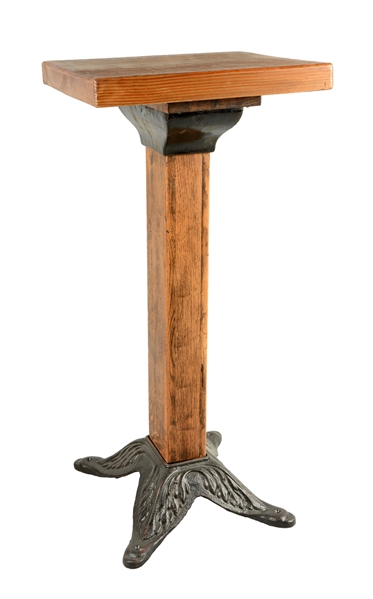 CAST IRON AND WOOD SLOT MACHINE STAND