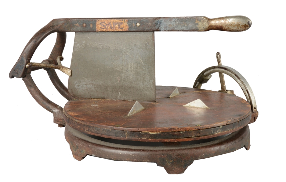 ANTIQUE COMPUTING CHEESE CUTTER.