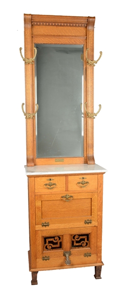 THEO A. KOCHS COMPANY TIGER OAK AND MARBLE BARBERS CABINET.