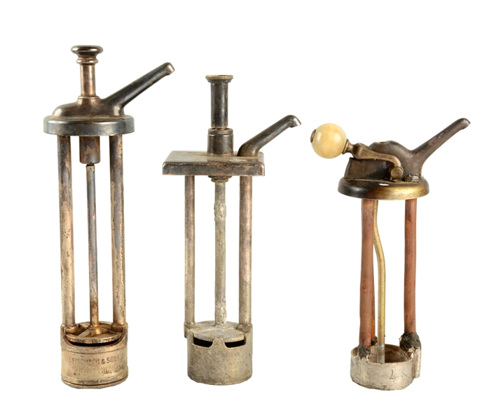 LOT OF 3: EARLY SYRUP DISPENSER PUMPS.