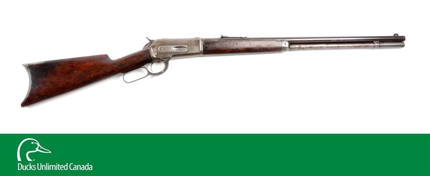 (A^) WINCHESTER MODEL 1886 LEVER ACTION RIFLE.
