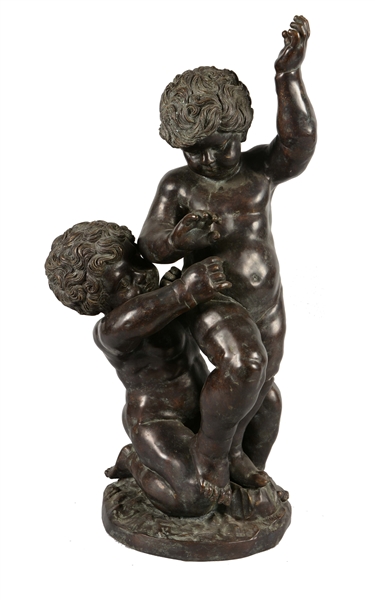 BRONZE SCULPTURE OF TWO BOYS.