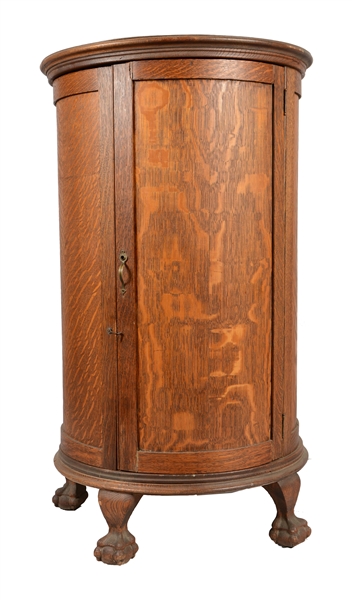 TIGER OAK ROUND CABINET.