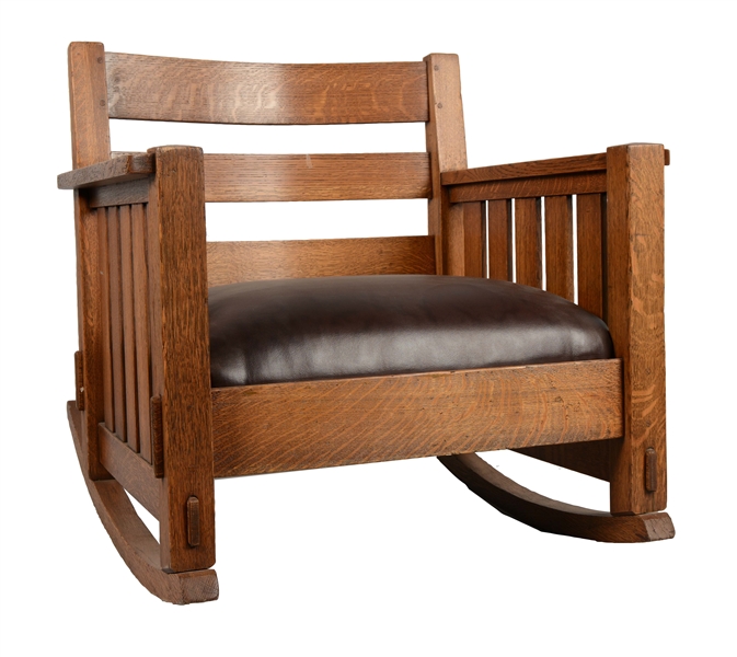 OVERSIZE OAK & LEATHER ROCKING CHAIR.