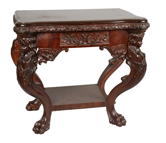 CARVED MAHOGANY TABLE.