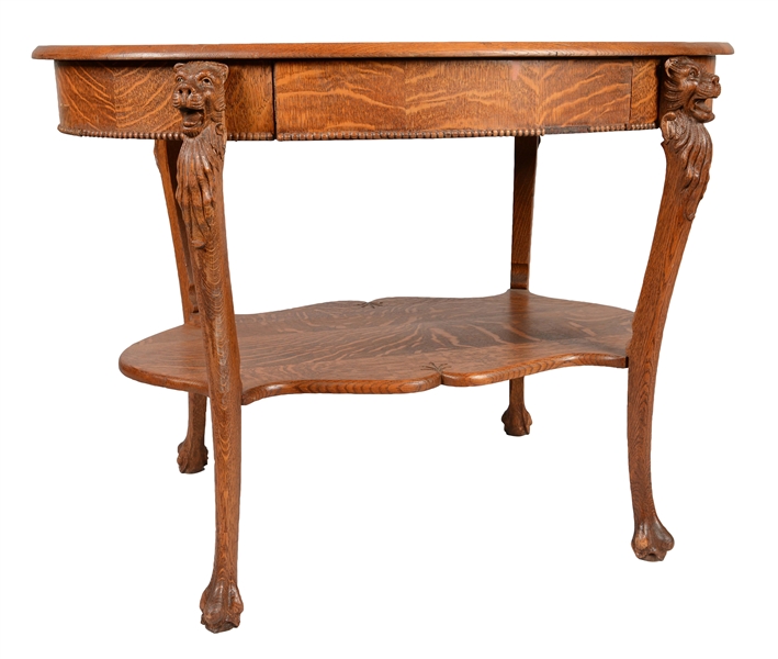 OVAL QUARTER SAWN OAK DESK.