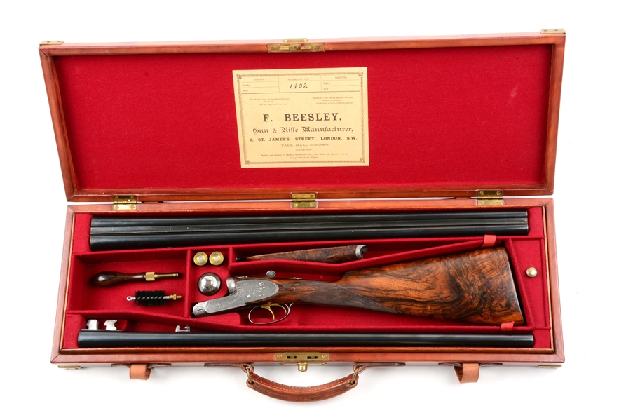 (A^) CASED BEESLEY PATENT FROM PURDEYS DOUBLE BARREL SIDELOCK SHOTGUN.