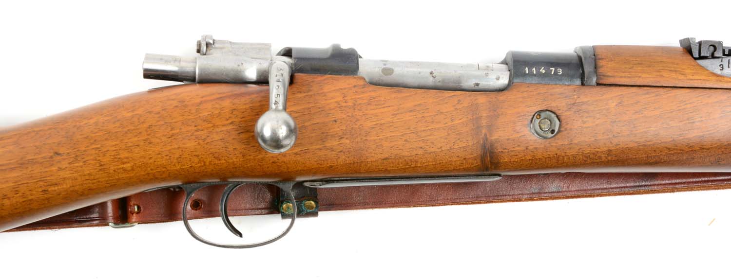 C) spanish model 1916 mauser short rifle. 