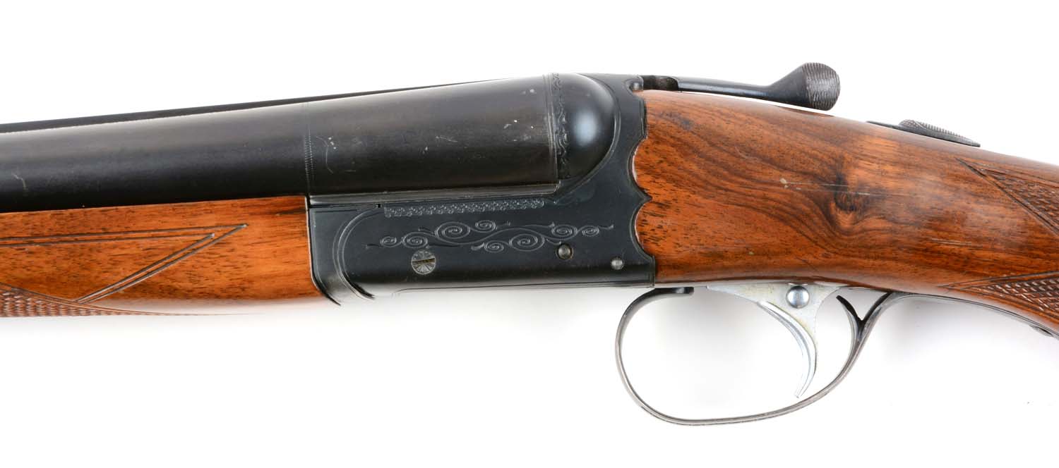 M) ithaca model 100 double barrel boxlock shotgun. 