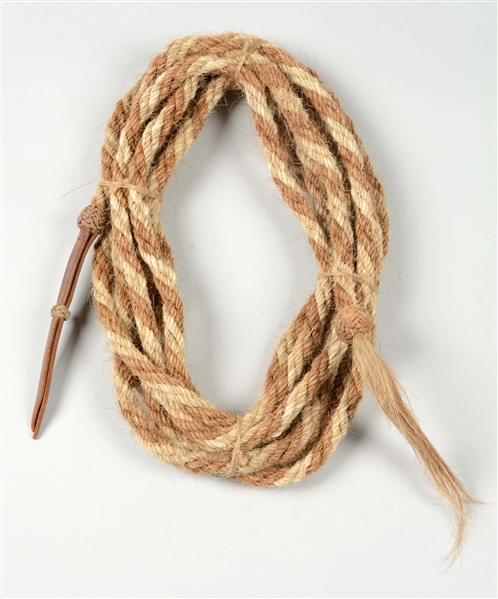 TAN AND WHITE BRAIDED TWISTED HORSEHAIR MECATE.