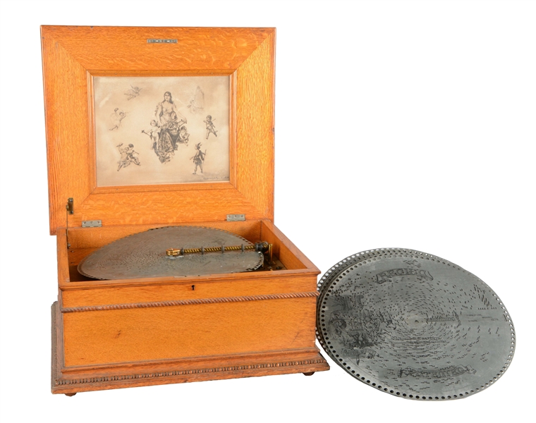 REGINA NO. 11 MUSIC BOX WITH TUNE SHEETS. 