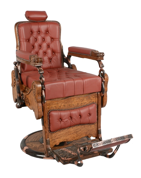 ANTIQUE KOKEN TUFTED LEATHER HYDRAULIC BARBER CHAIR.