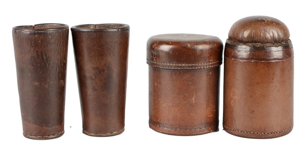 LOT OF 4: LEATHER DICE CUPS. 