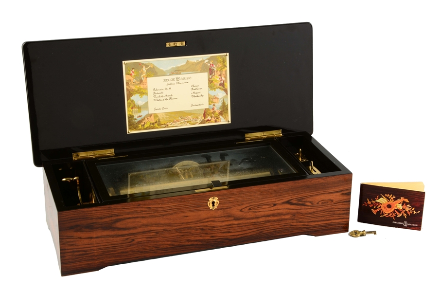 REUGE MUSIC BOX W/ FOUR TUNES. 