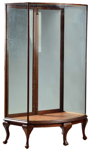 LARGE BOWED FRONT GLASS DISPLAY CABINET.