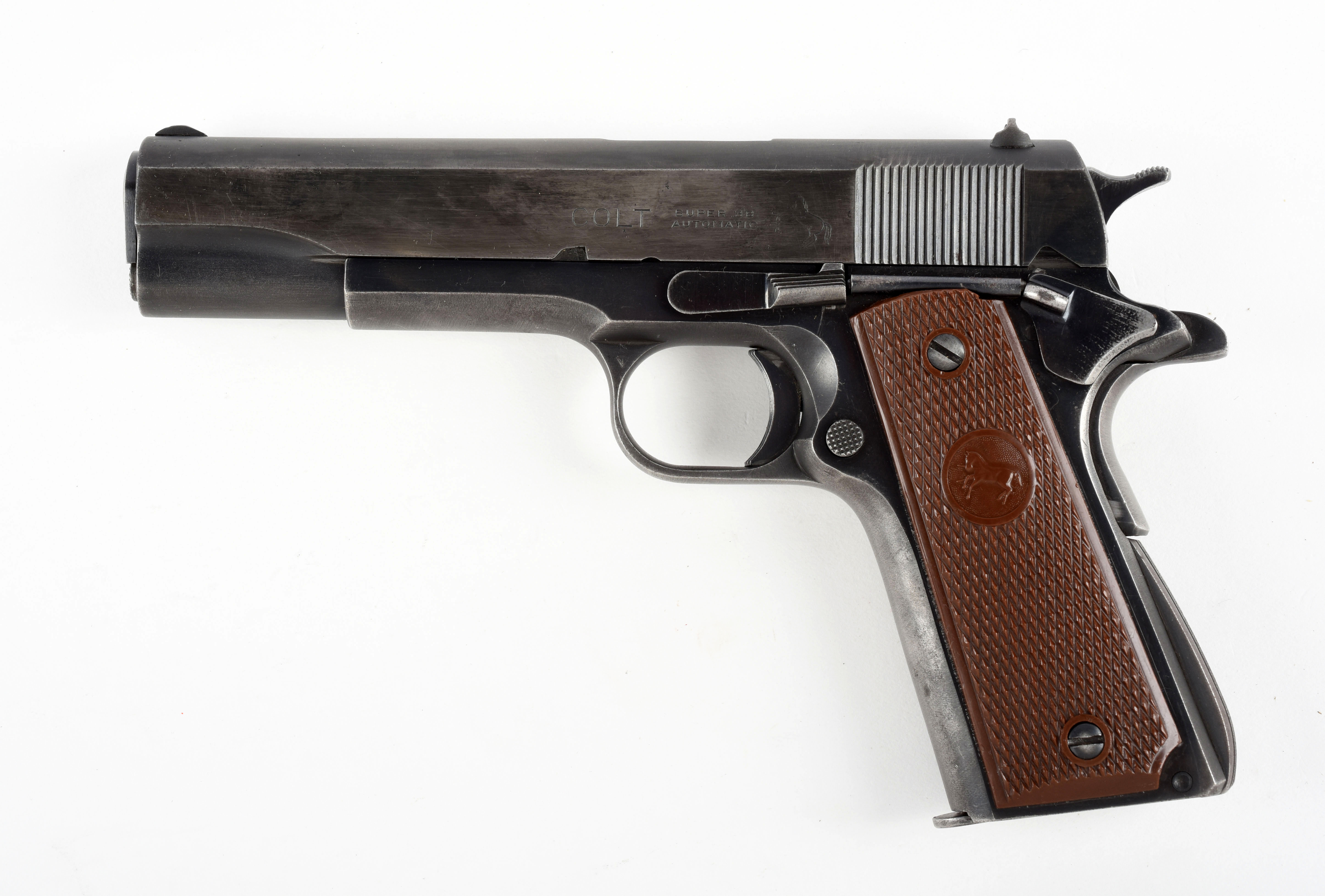 C) boxed colt model 1911-A1 (1949) .38 super semi-automatic pistol. 