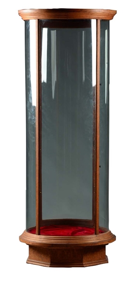 TALL ROUND GLASS DISPLAY CASE.
