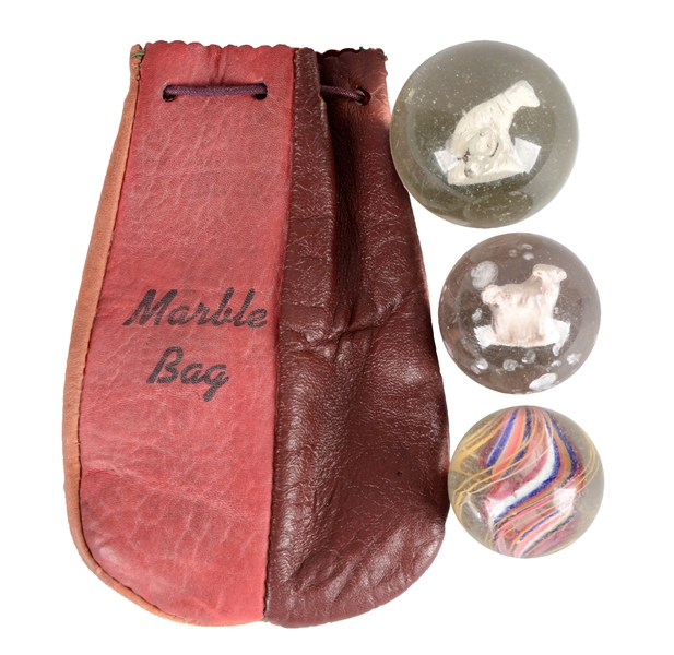 LOT OF 3: MARBLES WITH LEATHER BAG. 