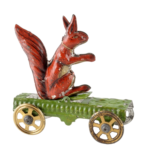 GERMAN MEIER TIN LITHO SQUIRREL PENNY TOY ON PLATFORM.