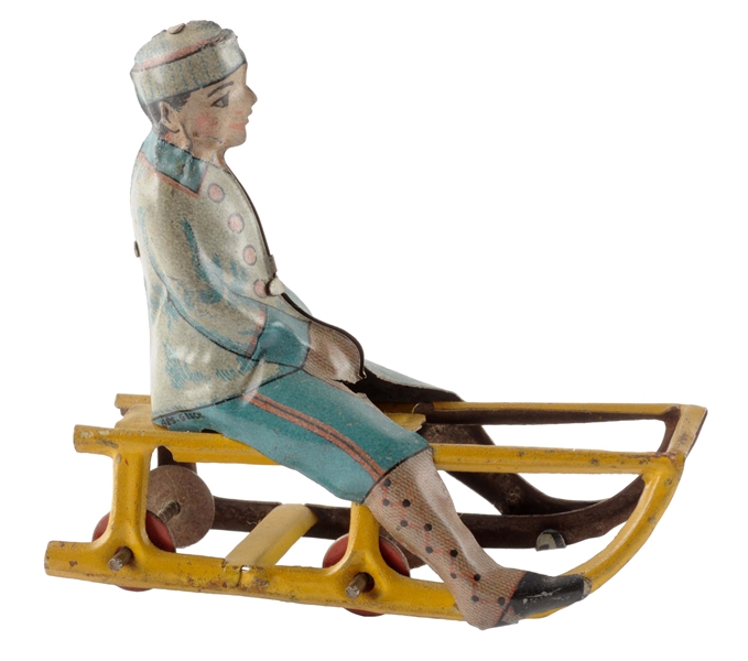 GERMAN MEIER TIN LITHO BOY ON SLED PENNY TOY.