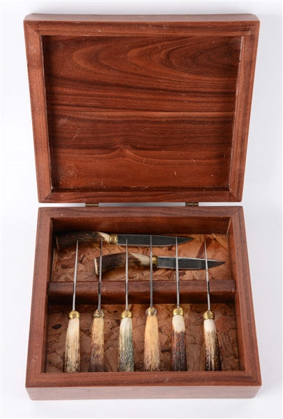 LOT OF 8: R.H. RUANA STAG HANDLED STEAK KNIVES IN HARD WOOD BOX.