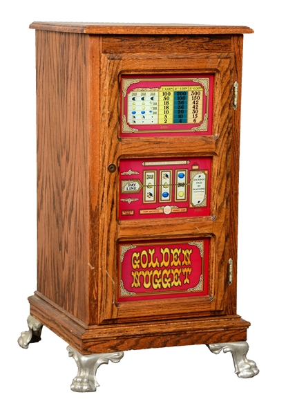 MULTI-COLORED GOLDEN NUGGET GLASS FRONT SLOT MACHINE STAND.