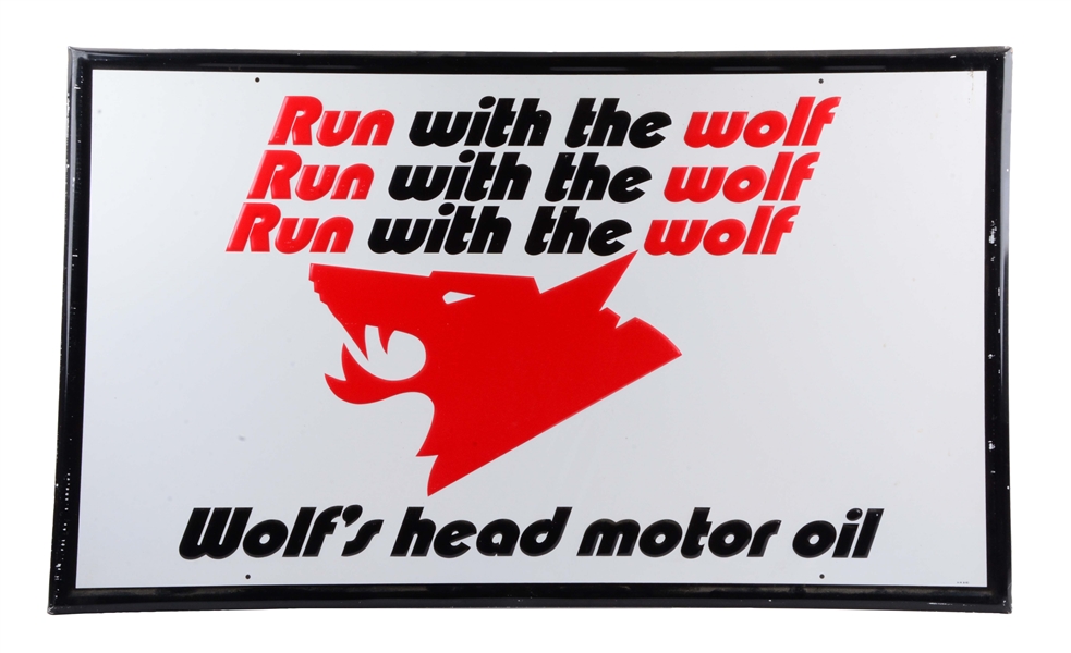 WOLFS HEAD MOTOR OIL EMBOSSED METAL SIGN.