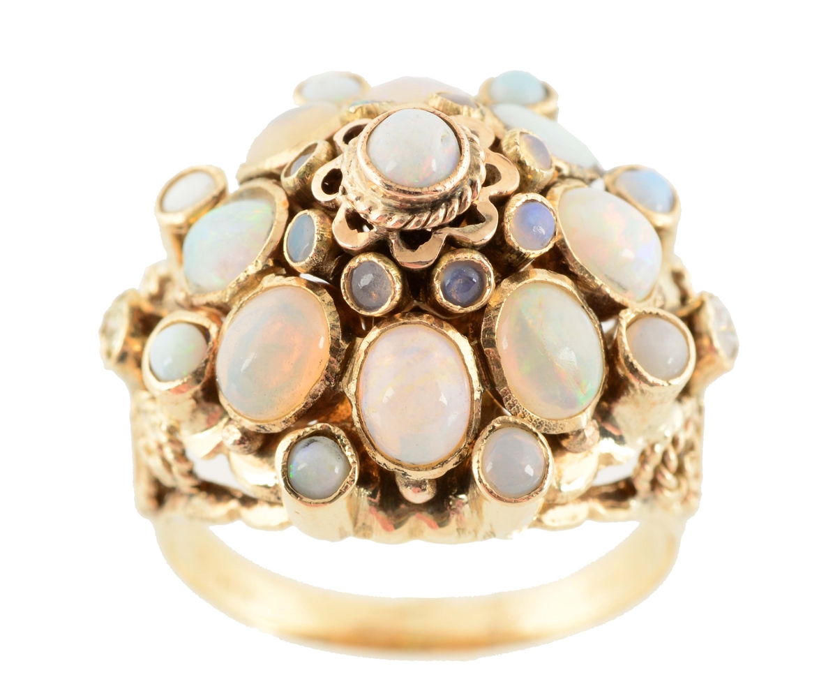 A 14K YELLOW GOLD ART DECO OPAL RING.