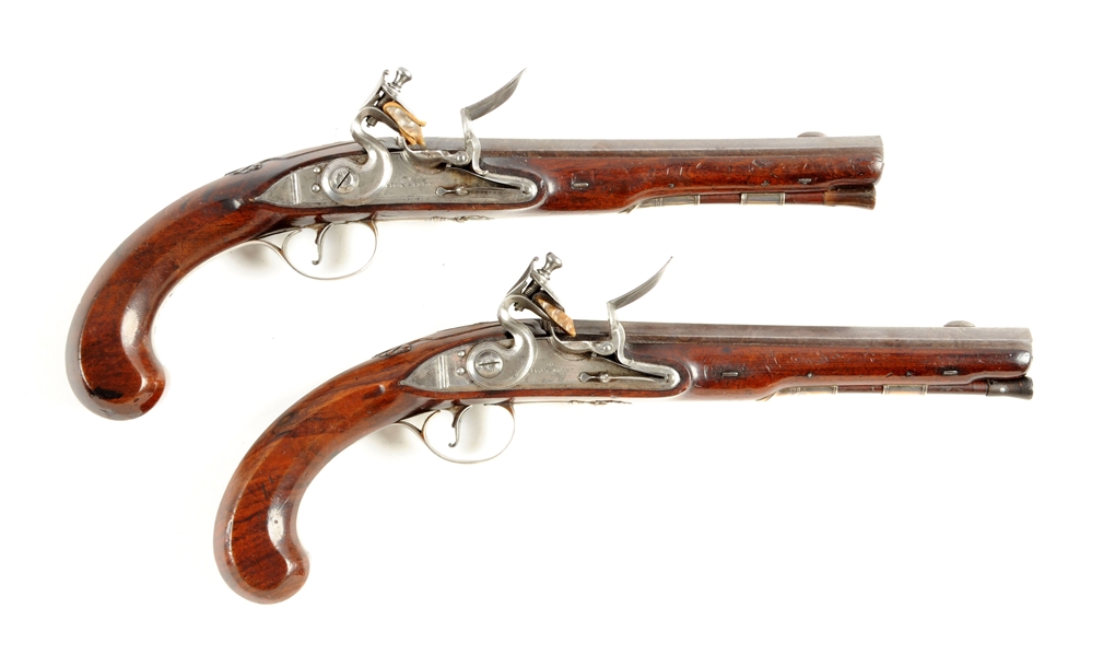 (A) PAIR OF EARLY SILVER-MOUNTED ENGLISH FLINTLOCK DUELING PISTOLS BY HENSHAW.