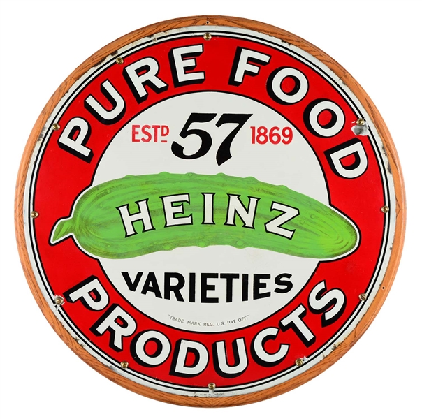 RESTORED HEINZ PURE FOOD PRODUCTS W/ PICKLE GRAPHIC PORCELAIN SIGN.