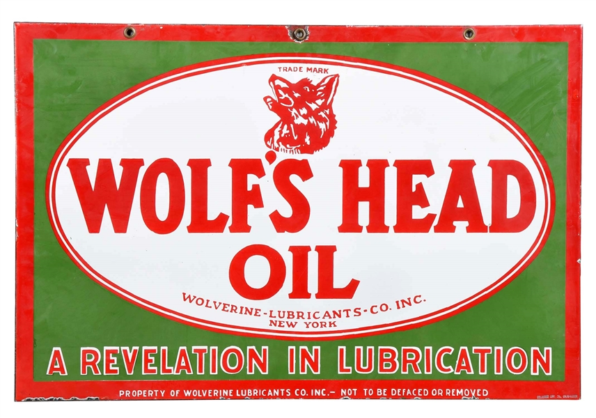 WOLFS HEAD OIL MOTOR OIL PORCELAIN SIGN W/ WOLF GRAPHIC.