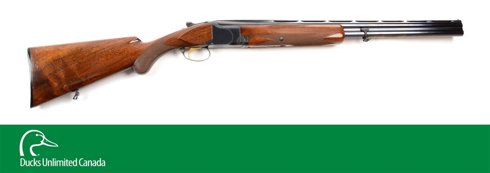 (M^) BELGIAN BROWNING SUPERPOSED OVER AND UNDER 12 BORE SHOTGUN.