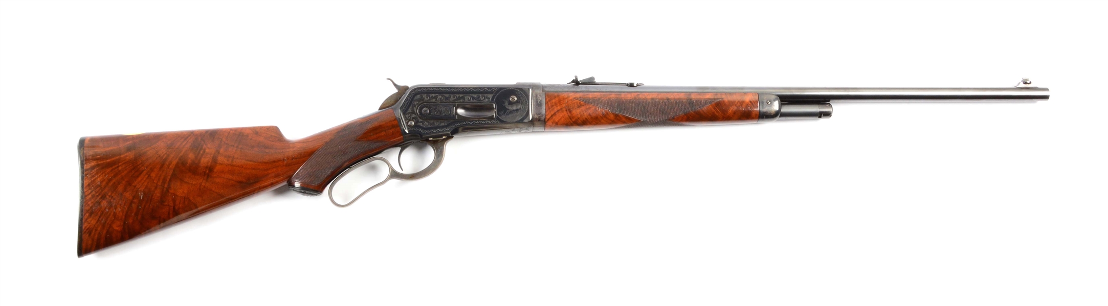 (A) EXQUISITE DELUXE FACTORY ENGRAVED WINCHESTER MODEL 1886 LEVER ACTION RIFLE.