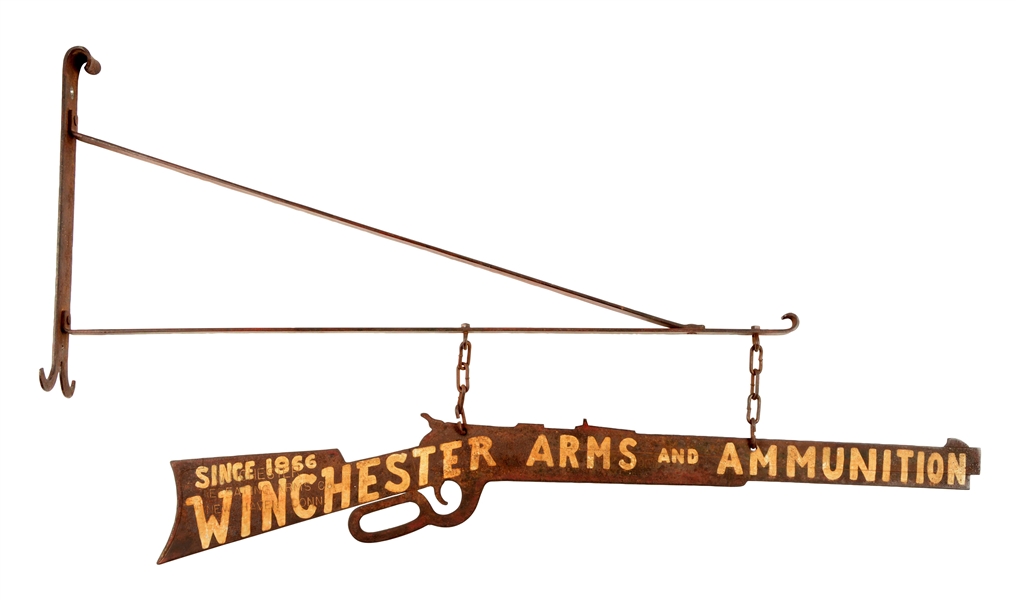 WINCHESTER ARMS & AMMUNITION HANGING METAL STORE SIGN.
