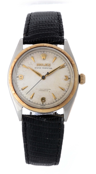 VINTAGE ROLEX STAINLESS STEEL AND 14K YELLOW GOLD OYSTER PERPETUAL WRISTWATCH MODEL NUMBER 6085.