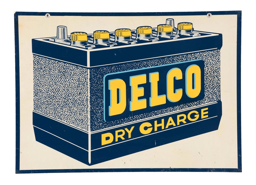 DELCO DRY CHARGE BATTERY TIN SIGN WITH BATTERY GRAPHIC.