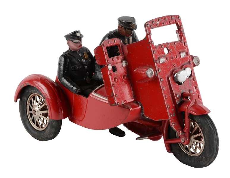 CAST IRON HUBLEY ARMORED MOTORCYCLE WITH SIDE CAR.