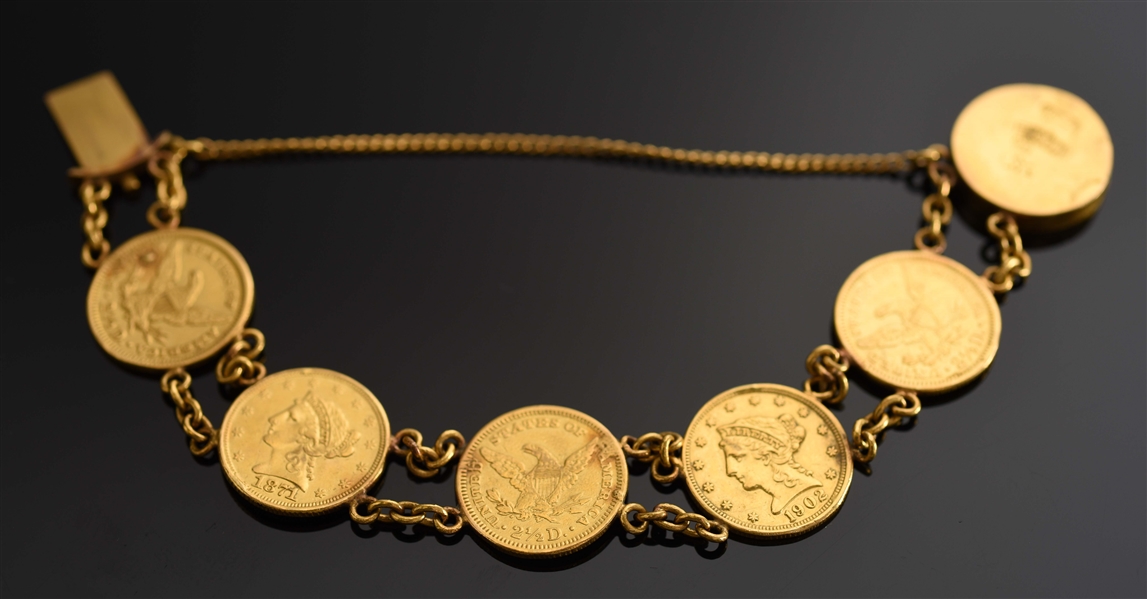 GOLD BRACELET WITH 6 2-1/2" GOLD LIBERTY AMERICAN COINS.