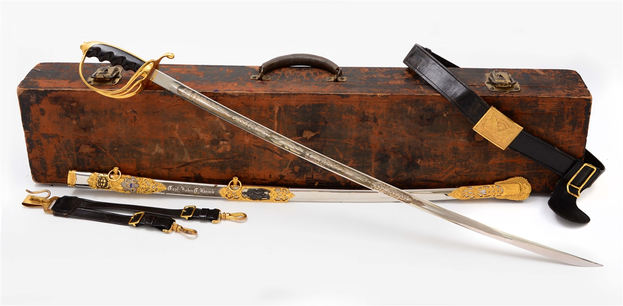 FINE U.S. MODEL 1902 OFFICERS PRESENTATION SWORD WITH BELT AND LEATHER PRESENTATION CASE.