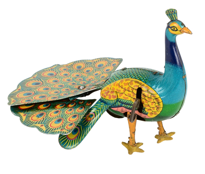 JAPANESE TIN LITHO WIND-UP PEACOCK TOY.