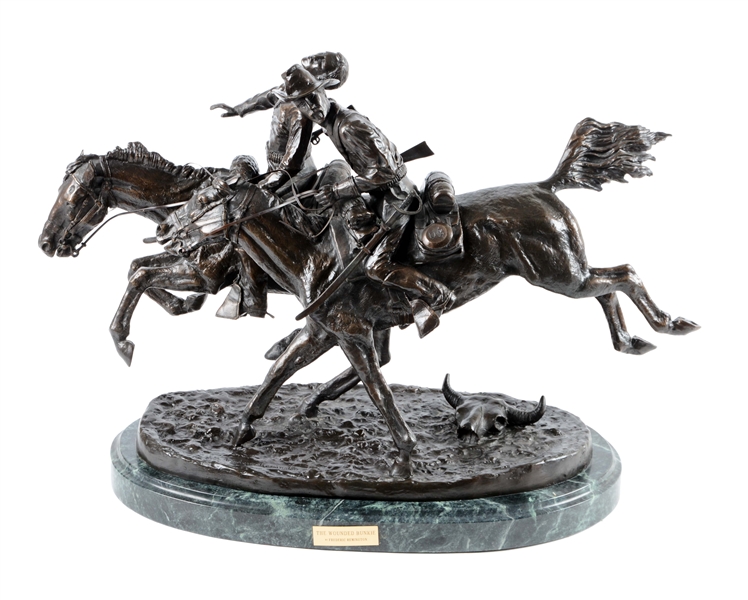 FREDERICK REMINGTON "WOUNDED BUNKIE" BRONZE STATUE.