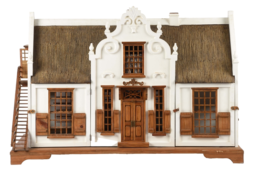 WELL CONSTRUCTED WOODEN DOLLHOUSE.