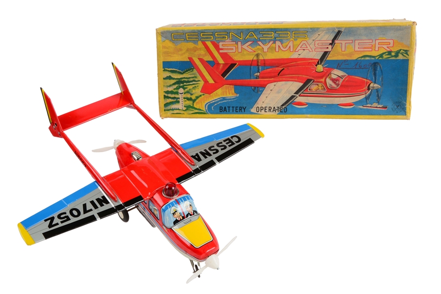 JAPANESE TIN LITHO BATTERY OPERATED CESSNA SKYMASTER AIRPLANE.