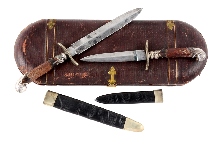 LOT OF 2: CASED SET OF EARLY DAGGERS.
