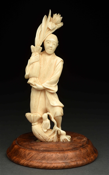 IVORY CHINESE FIGURE ON WOODEN STAND. 