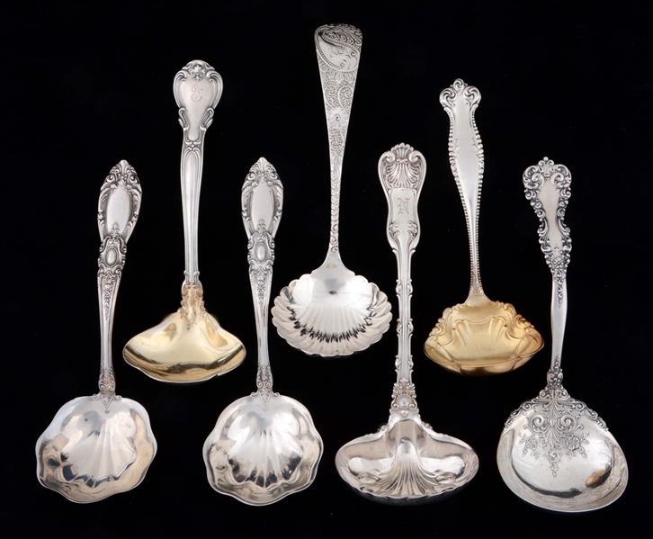 LOT OF 7: STERLING SILVER GRAVY SPOONS. 