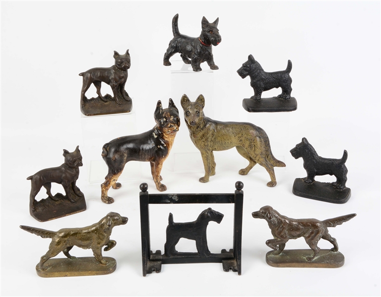 LOT OF 10: ASSORTED CAST IRON DOGS. 